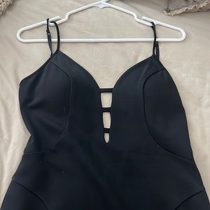 Only worn once Bebe Medi black dress with a mesh back